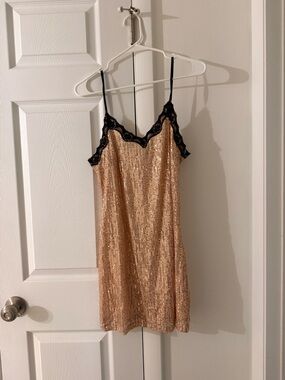 Champagne Sequin mini dress with black trim